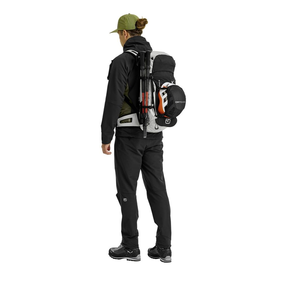 Versatile alpine backpack Traverse Pure 30 with eco-friendly design, ergonomic support, and gear attachments.