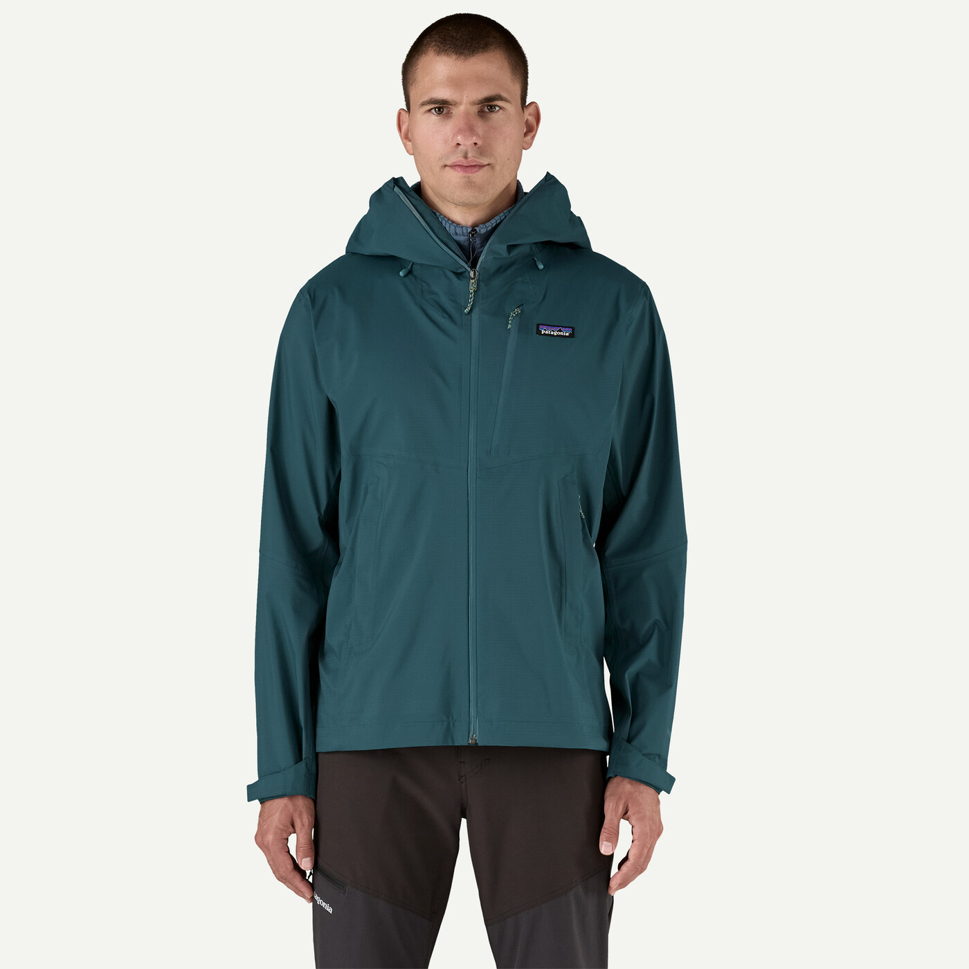 Granite Crest Rain Jkt, waterproof, PFC-free, recycled nylon, adjustable hood.