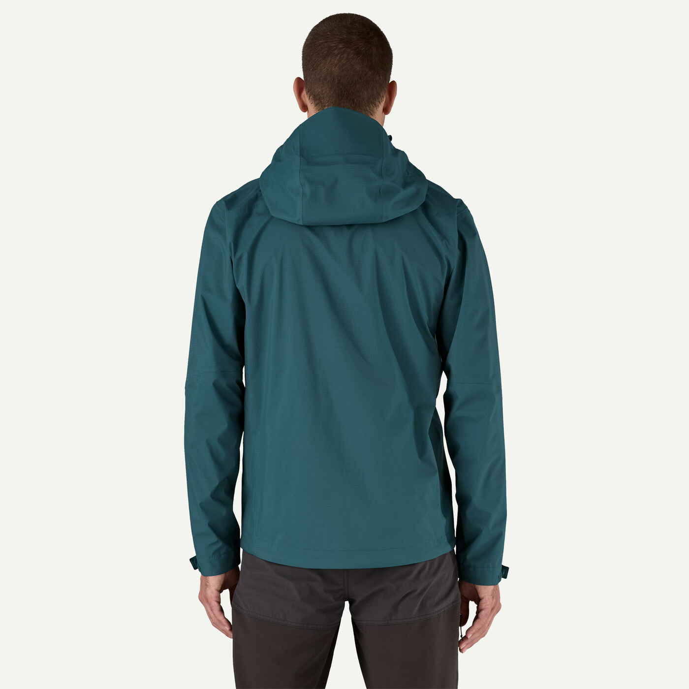 Waterproof M's Granite Crest Rain Jacket in recycled nylon with adjustable hood, back view.