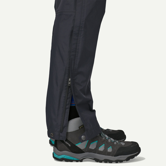 Torrentshell 3L Rain Pants with full-length side zippers and hiking boots.