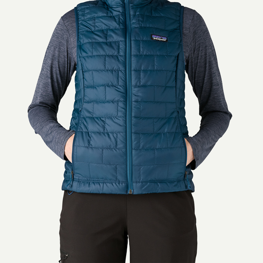 W's Nano Puff Vest in blue, featuring lightweight, windproof, and water-repellent recycled polyester with PrimaLoft® Gold Insulation Eco.