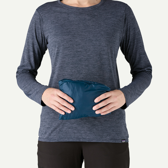 W's Nano Puff Vest; compressible and eco-friendly PrimaLoft insulation; Fair Trade Certified; lightweight and water-repellent; folded.