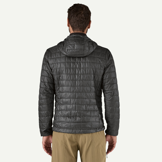 Nano Puff Hoody in recycled polyester, shown from the back, features lightweight insulation and quilted design.