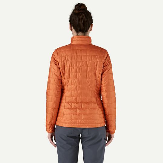 Women's Nano Puff Jacket in orange with lightweight, quilted design and recycled insulation.