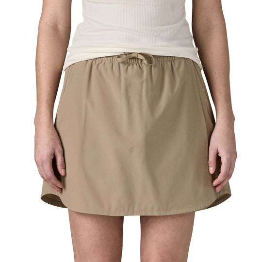 W's Fleetwith Skort in beige with elastic waistband and front pockets.
