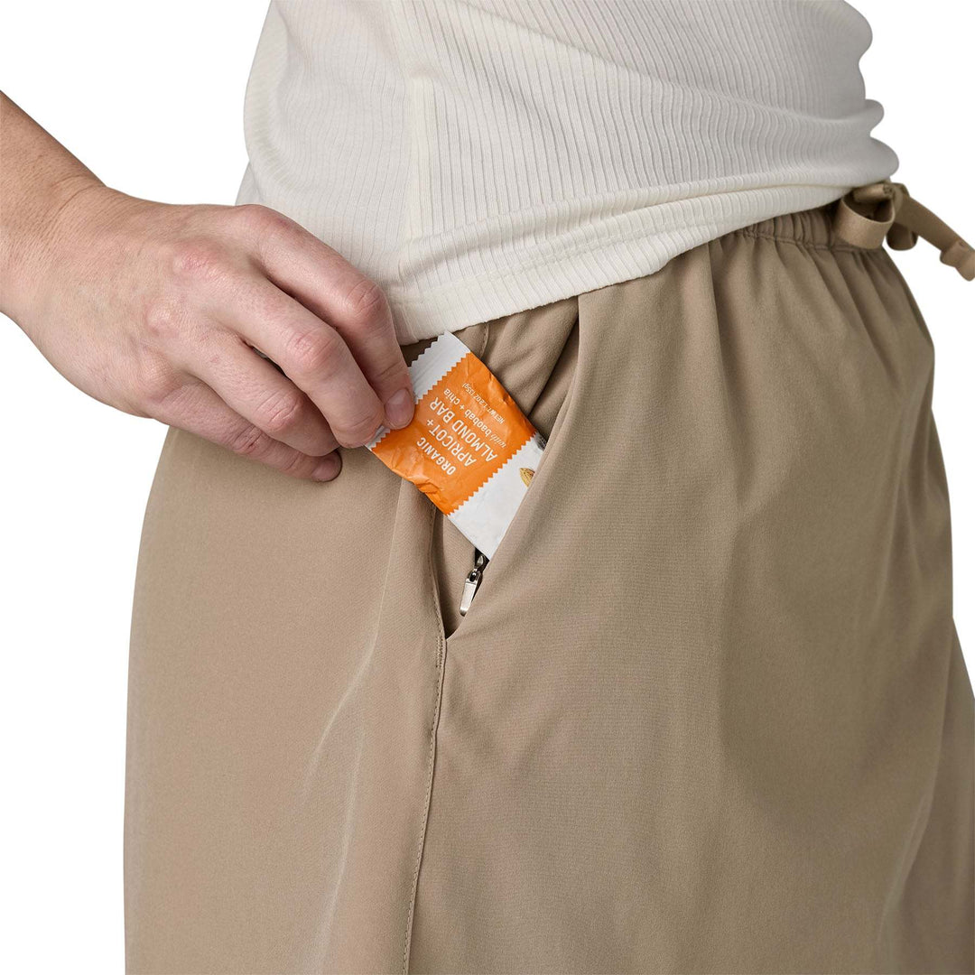 Woman wearing W's Fleetwith Skort with elastic waistband and hidden zip pocket.