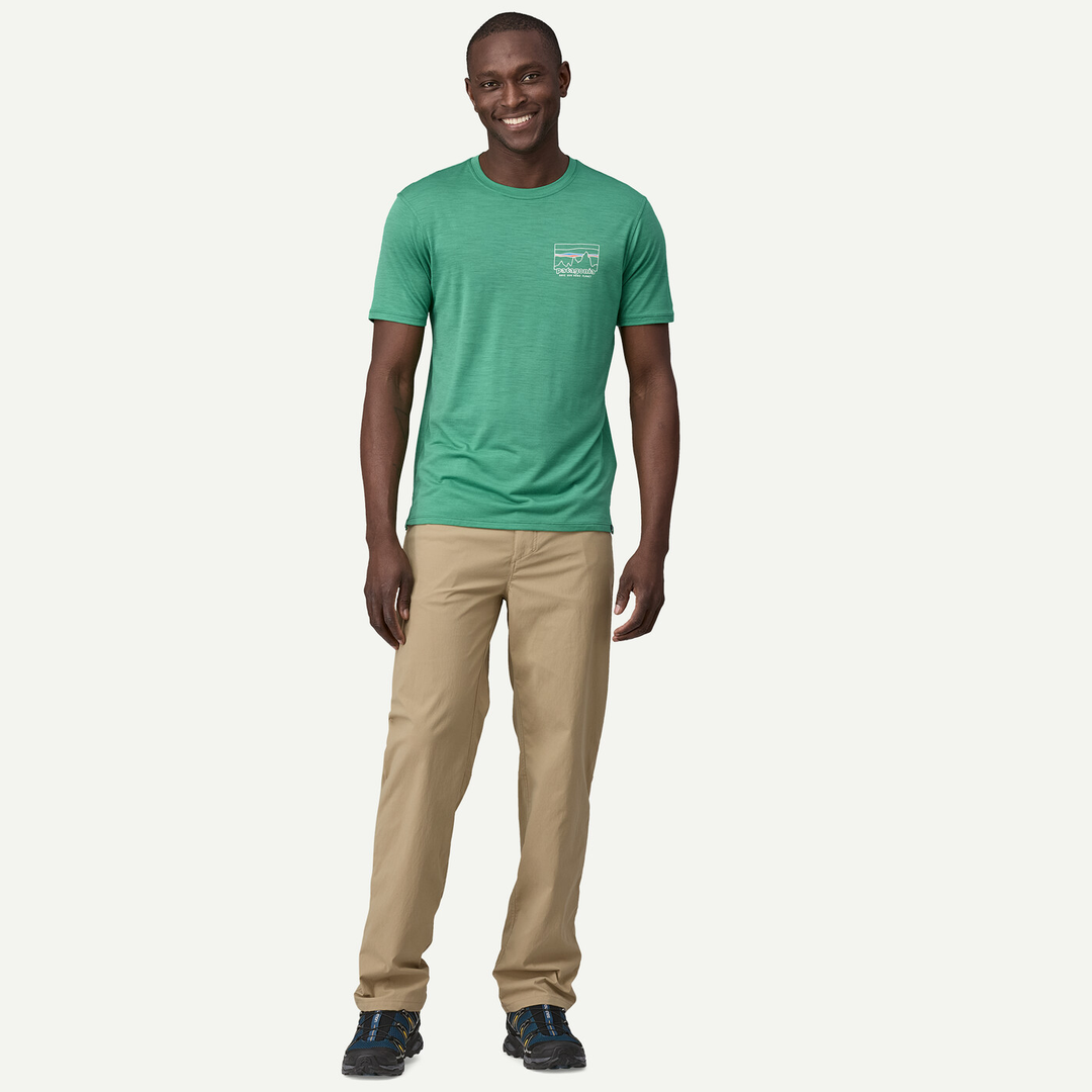 M's Quandary Pants in beige, regular fit, lightweight recycled nylon fabric with UPF 40+ protection, featuring multiple pockets and reinforced loops.