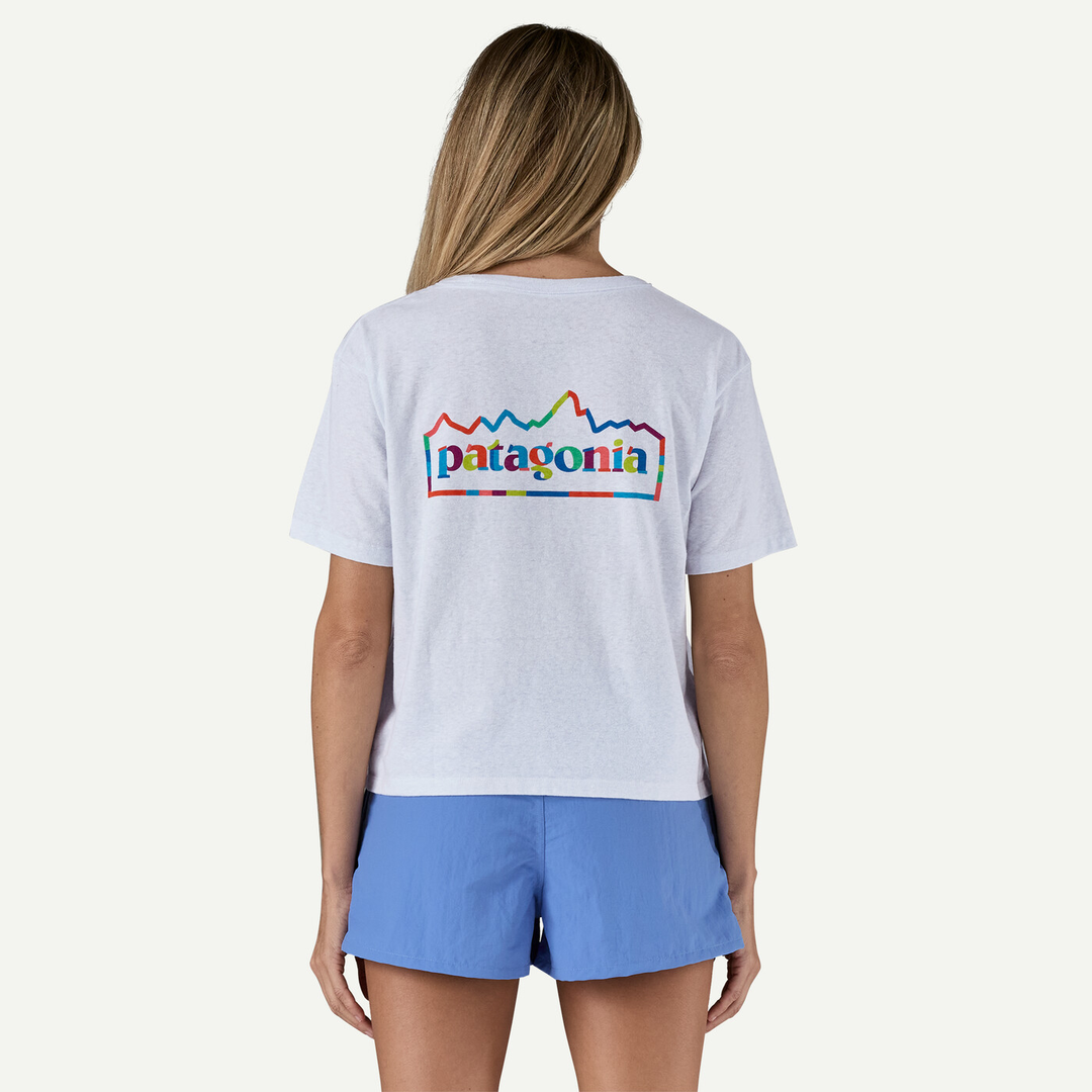 W's Unity Fitz Easy Cut Responsibili-Tee in white, featuring Patagonia's graphic design and logo.