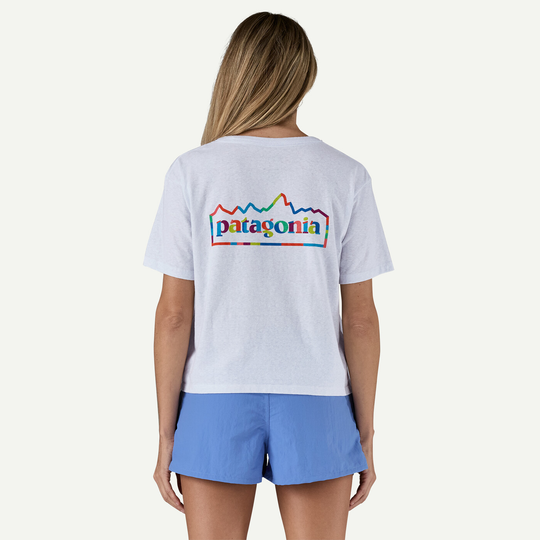 W's Unity Fitz Easy Cut Responsibili-Tee in white, featuring Patagonia's graphic design and logo.
