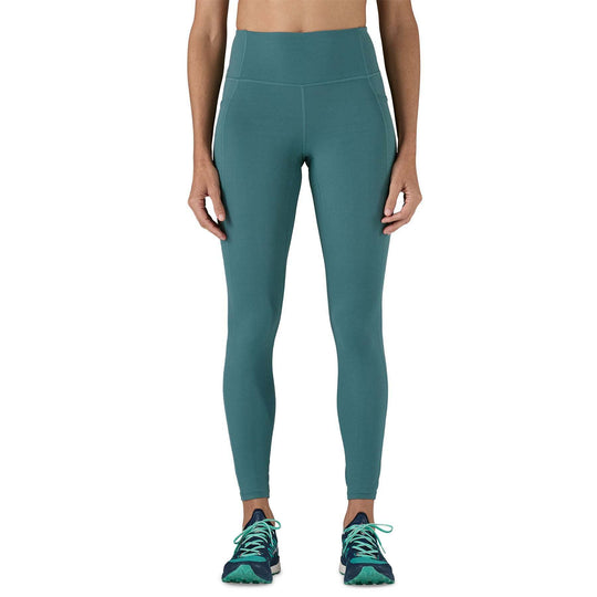 W's Maipo 7/8 Stash Tights in green, high-waisted, versatile leggings featuring recycled nylon, breathable fabric, and side pockets.