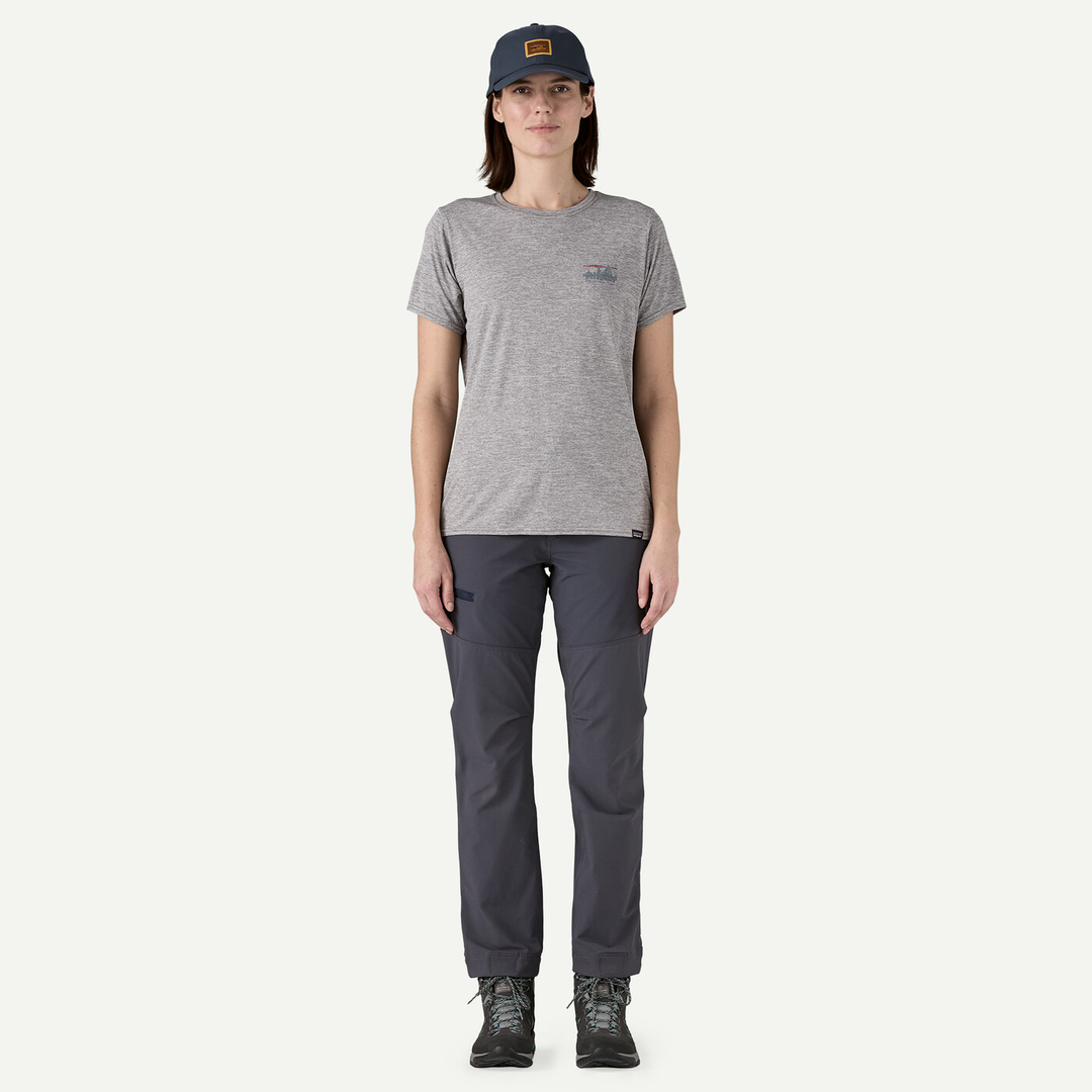 Women's Terravia Peak Pants in dark gray, featuring a slim fit designed for adventure with recycled nylon and elastane blend material.