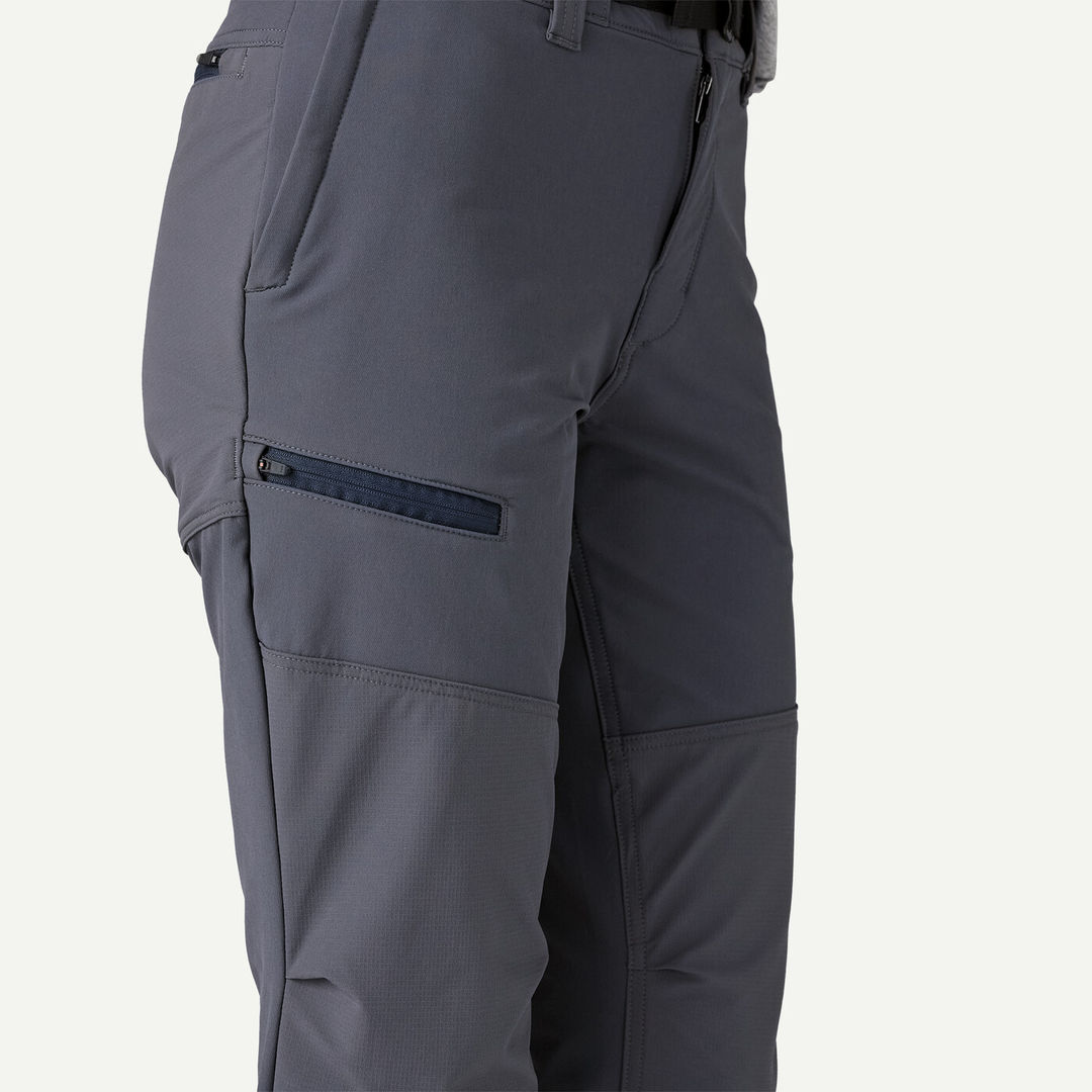 Terravia Peak Pants made of recycled nylon blend with adjustable belt and multiple zip pockets.