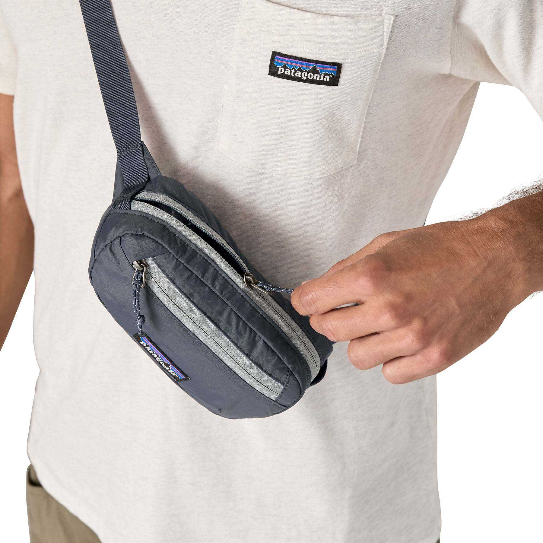 Terravia Mini Hip Pack in use, durable and lightweight, with compressible design and recycled materials.