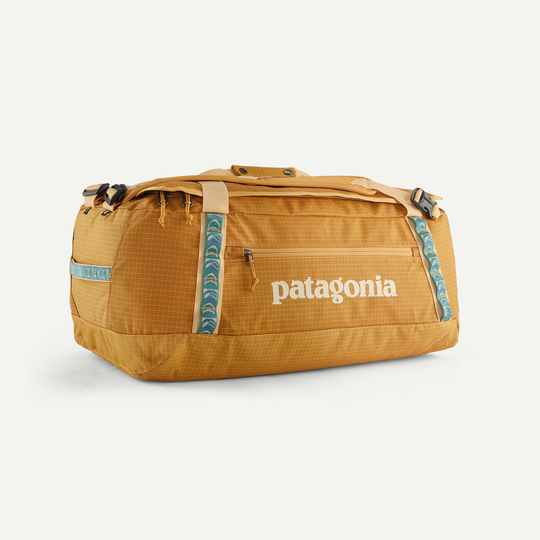 Black Hole Duffel 55L in recycled water-repellent fabric, ideal for travel and adventure.