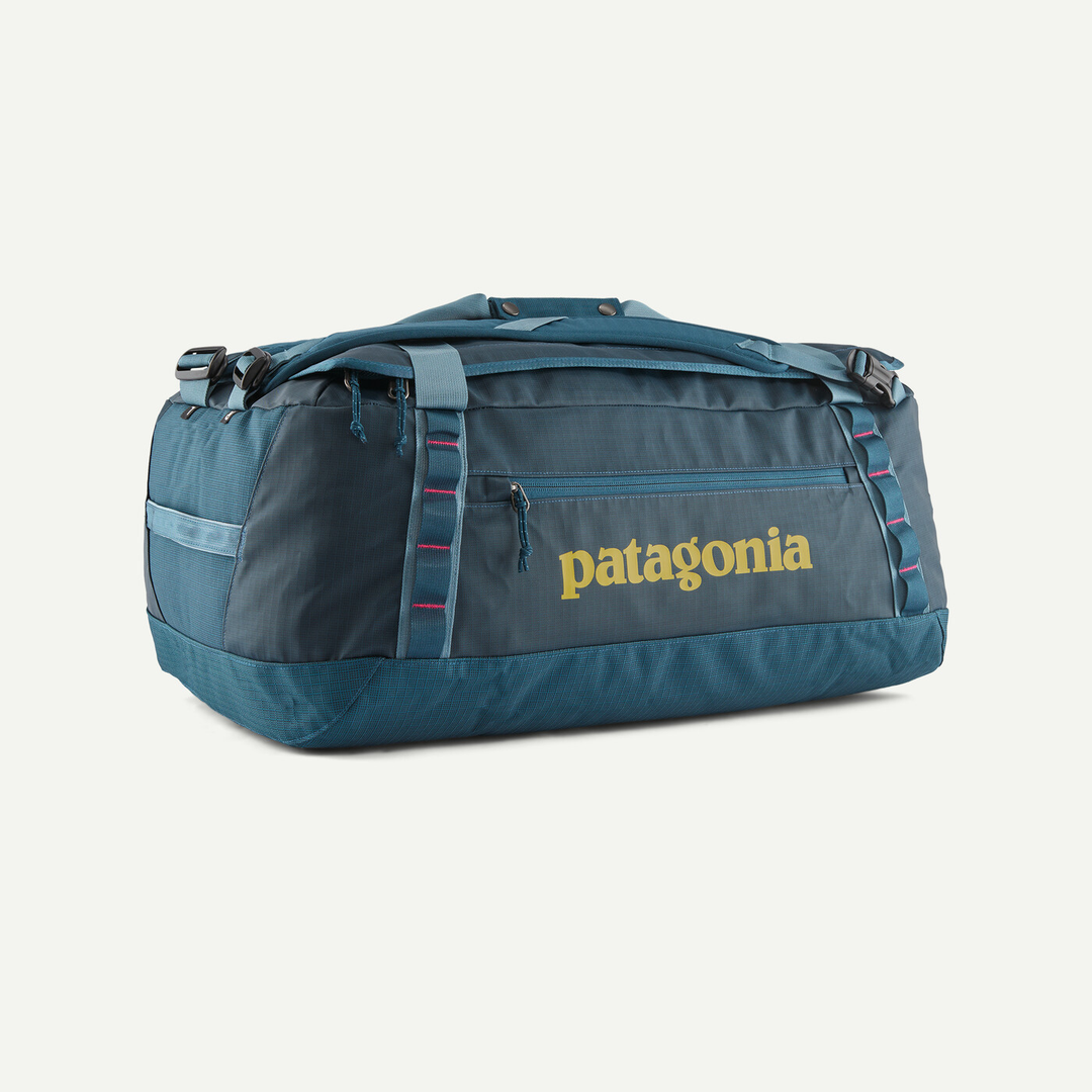 Black Hole Duffel 55L, blue, durable water-repellent, 100% recycled materials, spacious travel bag.