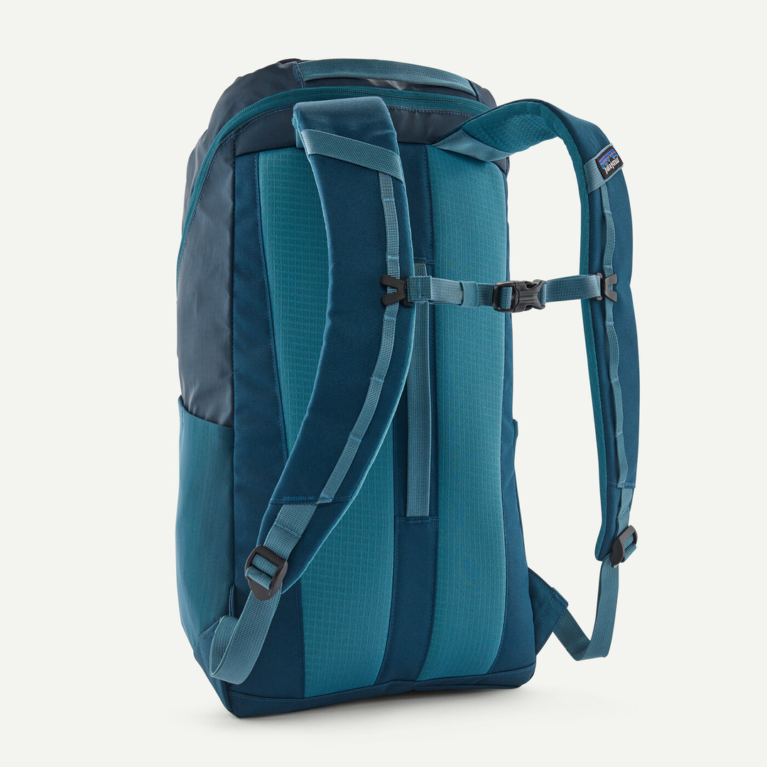 Black Hole Pack 25L, durable 25L backpack with recycled polyester and TPU, Fair Trade Certified™, features breathable back panel, laptop sleeve, water bottle pockets.