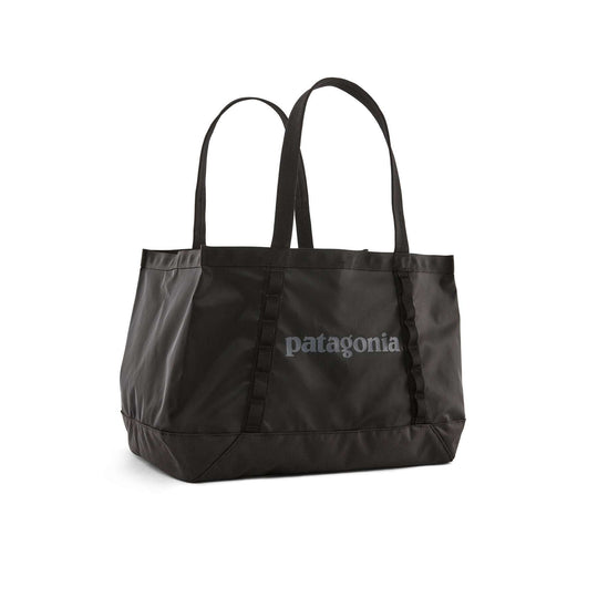 Black Hole Tote 25L, lightweight and durable recycled polyester bag, Patagonia logo.