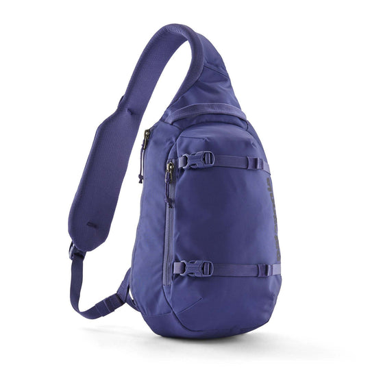 Ergonomic Atom Sling 8L backpack in recycled polyester with single shoulder strap, front zip pocket, and dual-section main compartment.