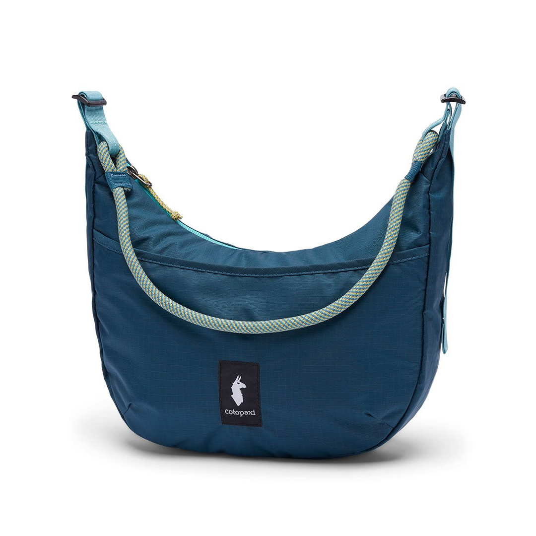 Trozo 8L Shoulder Bag in blue with adjustable climbing rope strap and multiple pockets for organization.