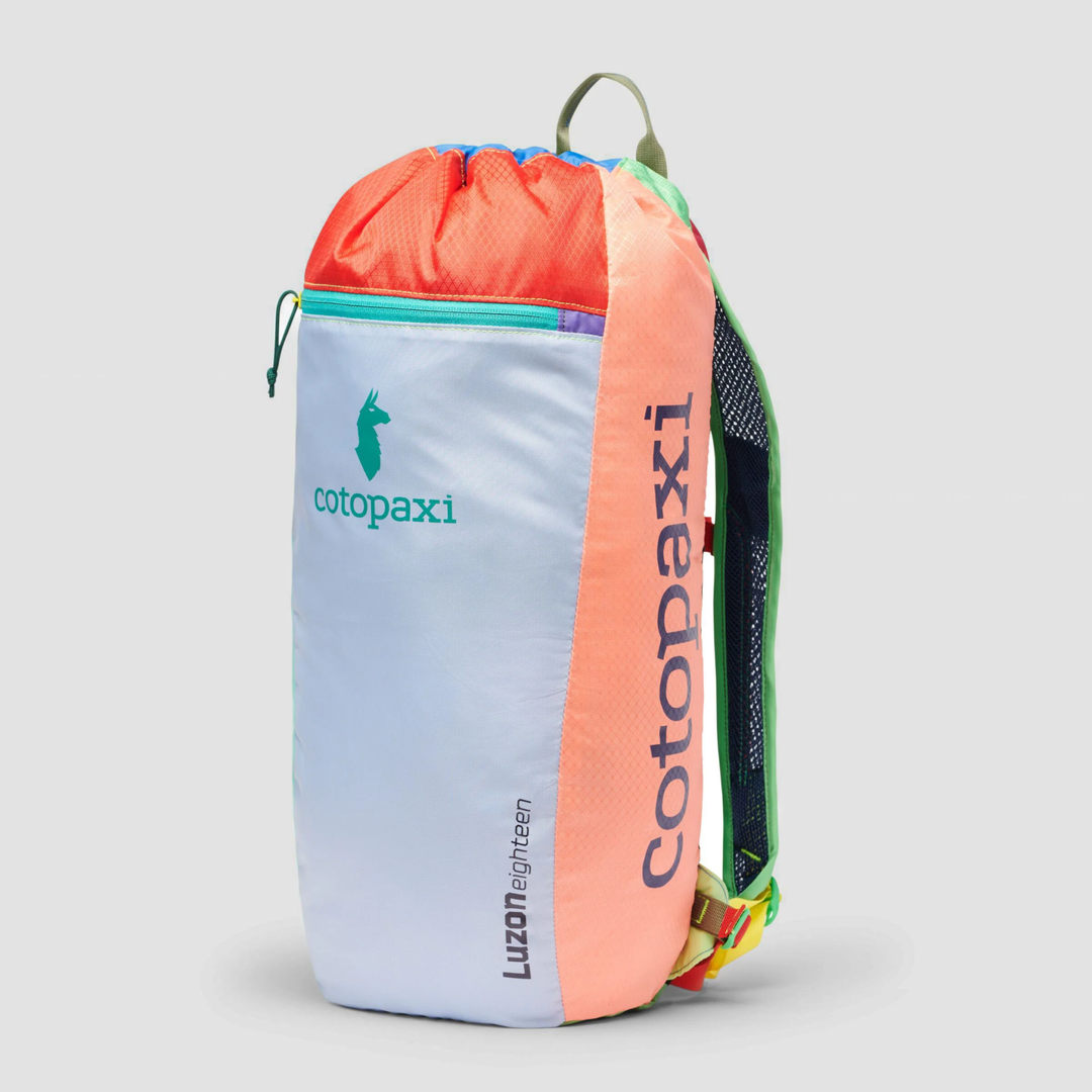 Luzon 18L Backpack in vibrant Del Día color, featuring lightweight nylon ripstop and mesh straps.