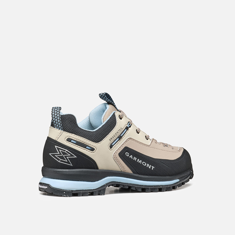 Dragontail Tech hiking shoe with beige and black microfiber upper, protective polyamide band, and extended lacing for mountain excursions.
