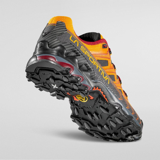 Ultra Raptor II trail running shoe with durable outsole, breathable air-mesh upper, and reinforced microfibre details for long-distance comfort.
