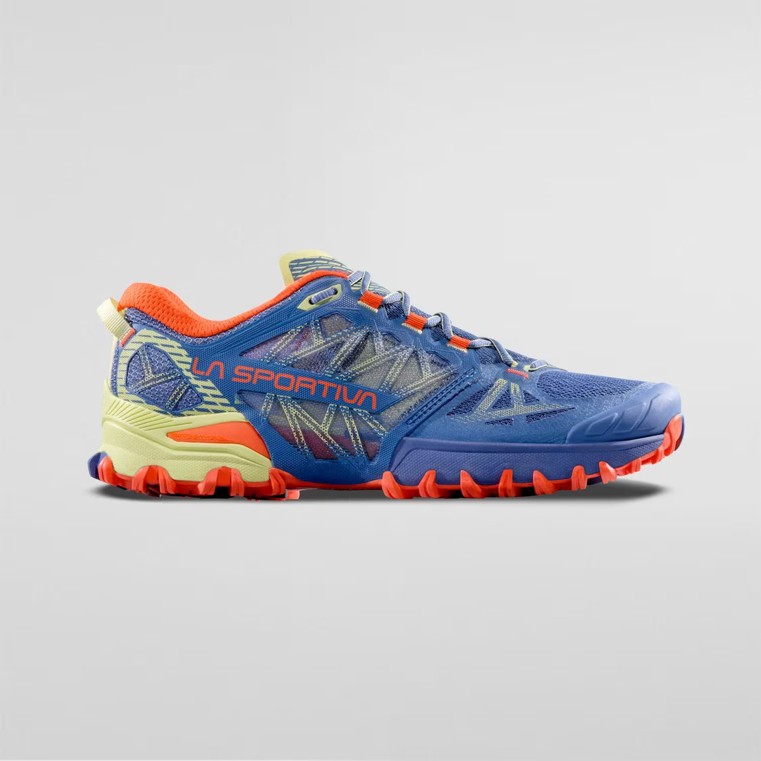 Bushido III Woman trail running shoe with breathable mesh and FriXion® Red sole for enhanced grip.