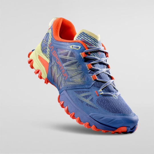 Bushido III Woman trail running shoe with aggressive grip and breathable design.