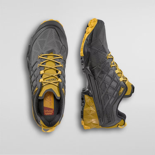 Akyra II Gtx shoes with 3D Grid construction and Impact Brake System, featuring yellow and gray design.