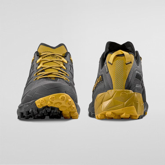 Trail running shoes Akyra II GTX with grey and yellow design, featuring Gore-Tex and rugged soles for stability and protection.