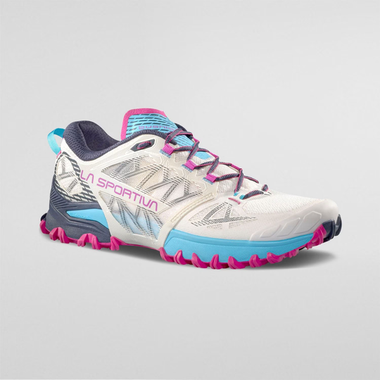 Bushido III Woman trail shoe with FriXion® Red sole and breathable slip-on design for enhanced grip and stability.