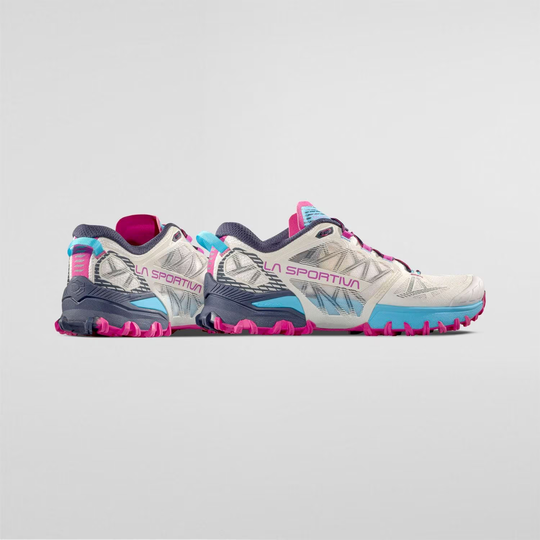 Trail running shoes, Bushido III Woman by La Sportiva, featuring a gripping FriXion® Red sole and breathable lateral panels.