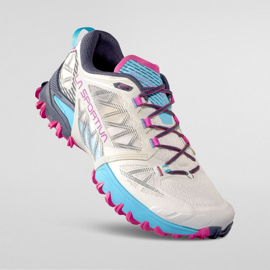 Bushido III Woman trail running shoe with aggressive grip, breathable design, and cushioned support.