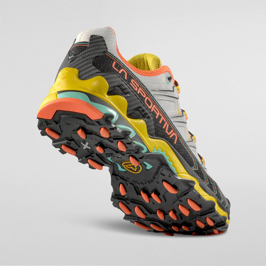 Trail running shoe Ultra Raptor II with breathable air-mesh upper and multi-color rugged sole.