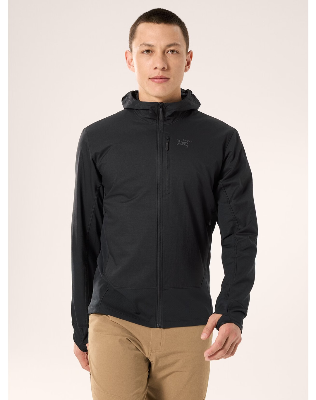 Konseal Hybrid Hoody M in black worn by a model.