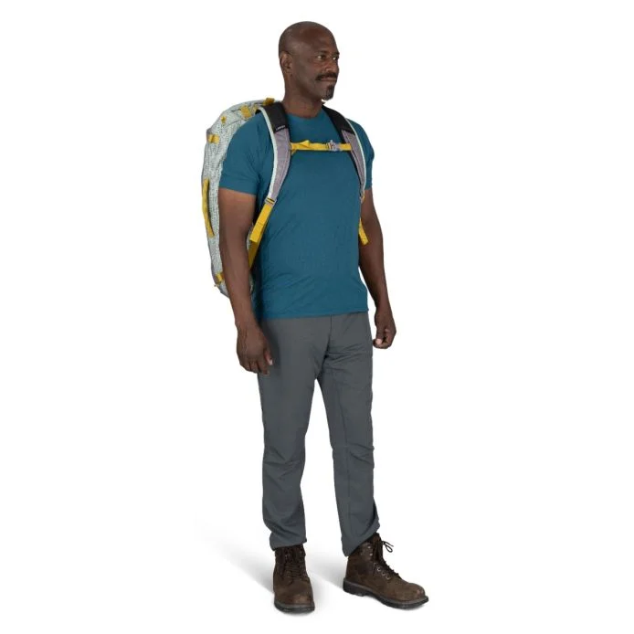Transporter 65 backpack worn by person, showcasing sturdy and weather-resistant design.