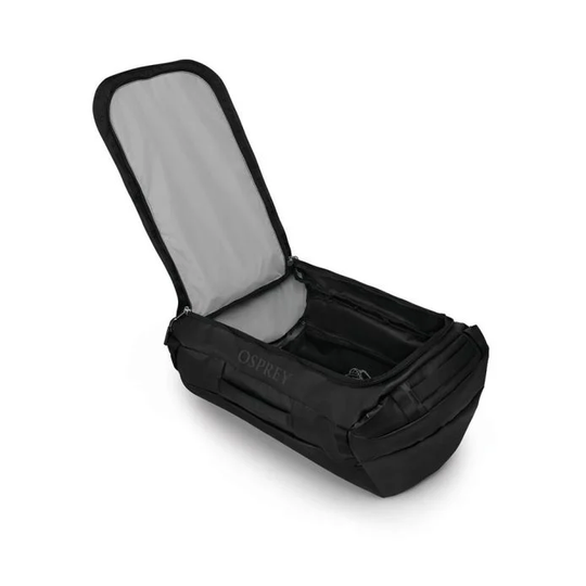 Transporter 65 duffel bag with open main compartment, durable and weather-resistant design.