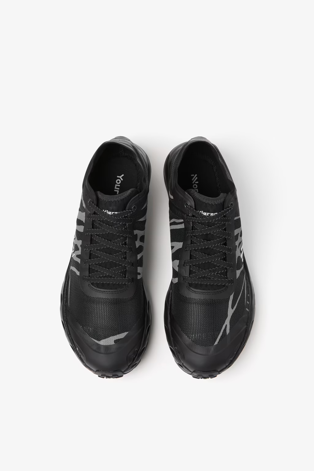 Kjerag Brut shoes with 6.5 mm grip studs, lightweight design, and breathable upper.
