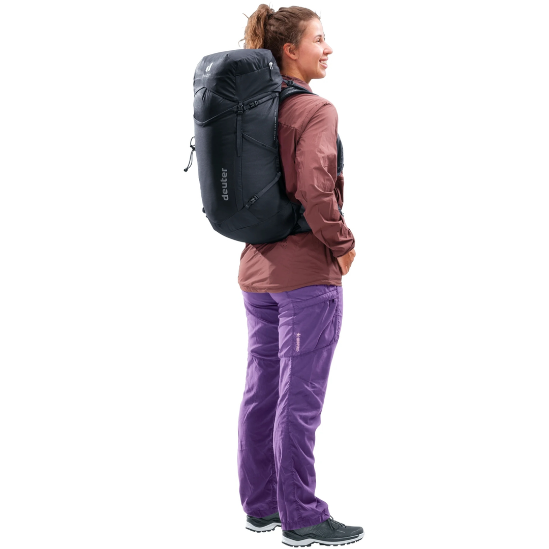 Speed Lite Pro 28 SL backpack worn by hiker in mountains.