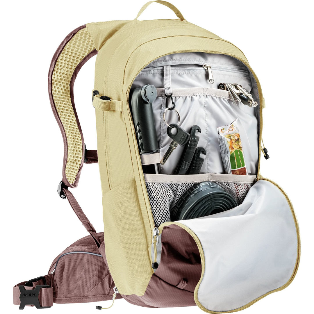 Compact 12+3 bike backpack with Airstripes system, versatile storage, hydration compartment, tool organizer, and helmet attachment.