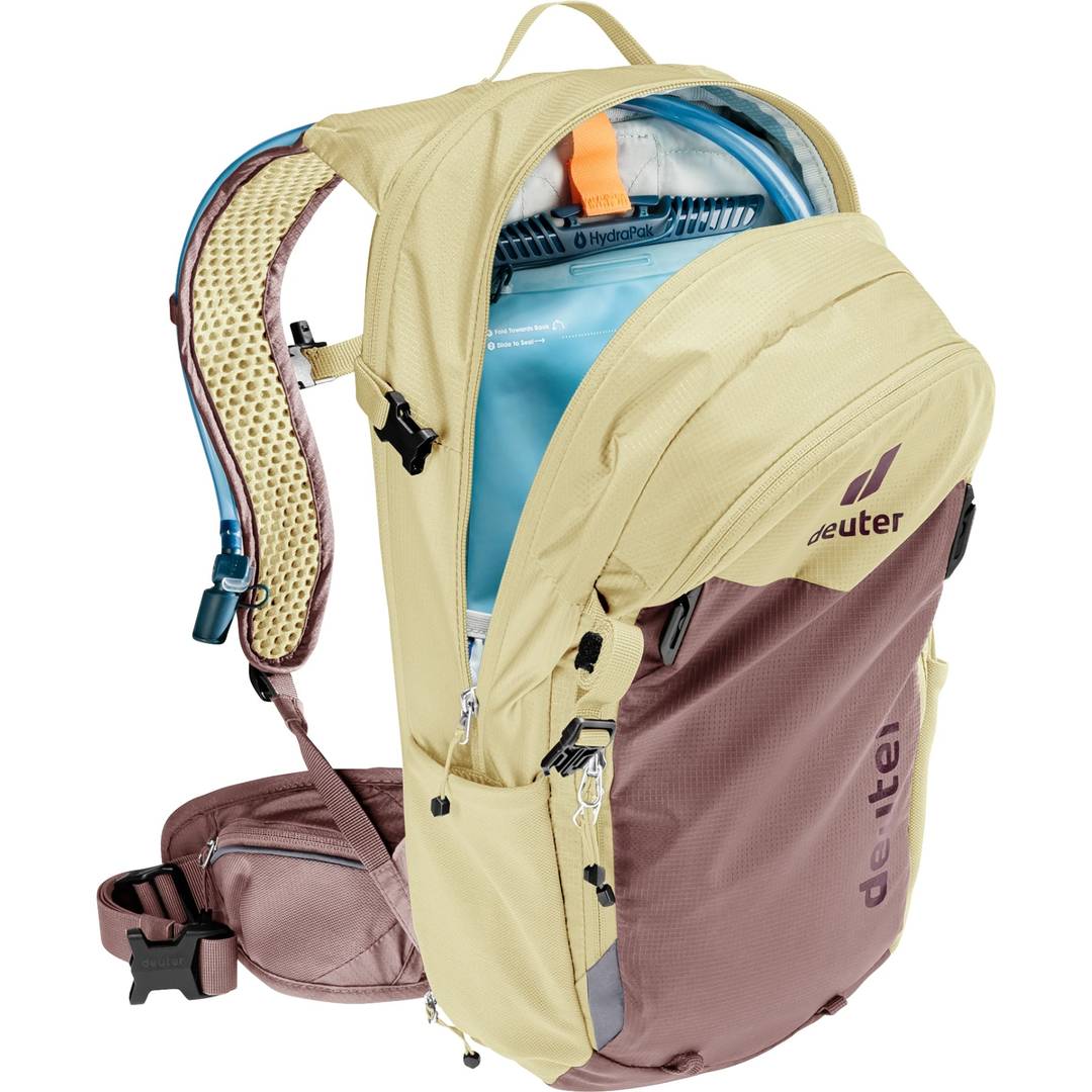 Compact 12+3 SL bike backpack with Airstripes system, hydration compartment, and helmet attachment.