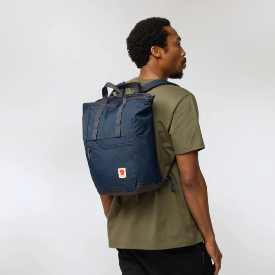 High Coast Totepack in recycled polyamide worn as a backpack.