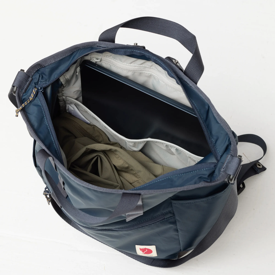 High Coast Totepack in recycled polyamide, showing laptop compartment and versatile handles.