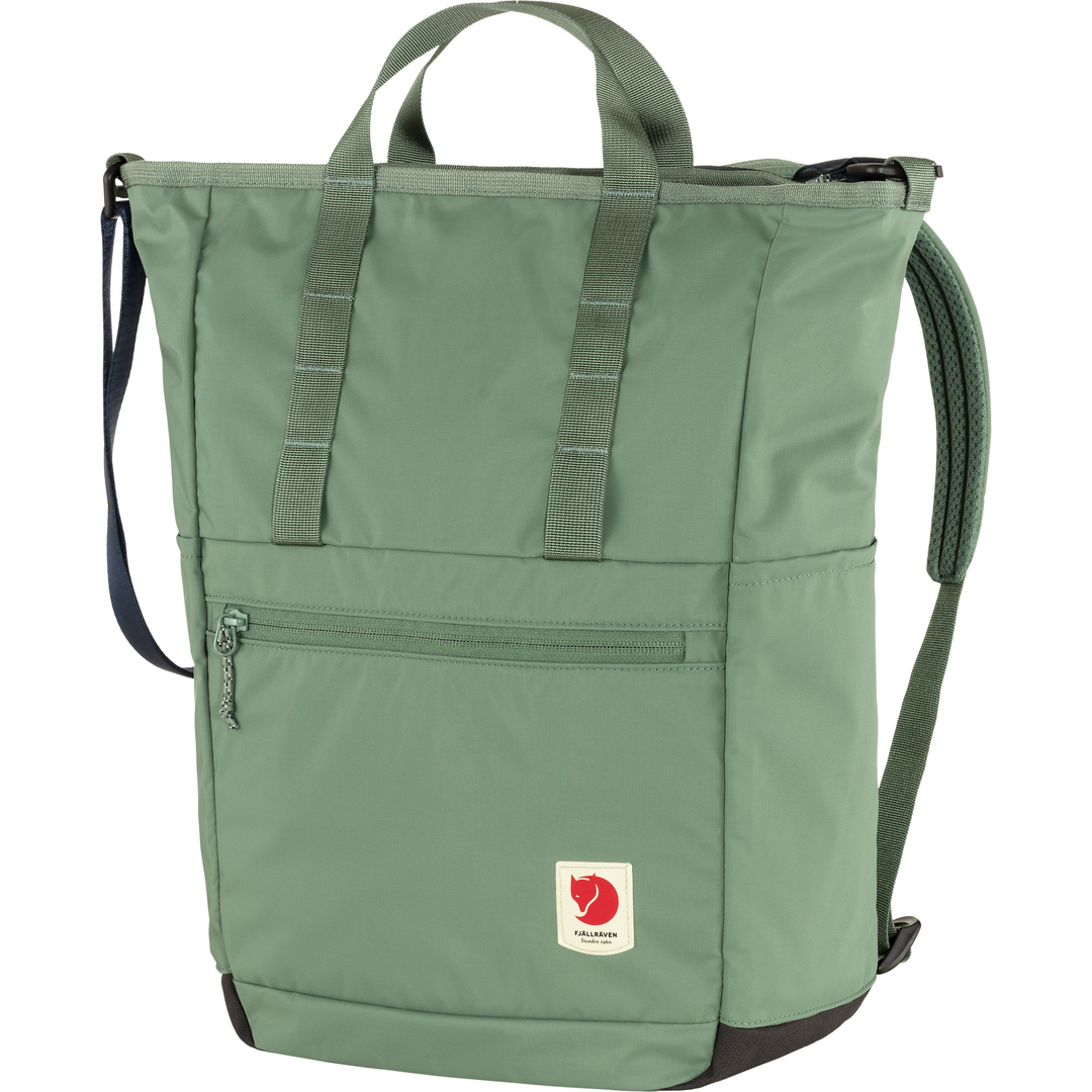 High Coast Totepack, green recycled polyamide bag with multiple straps, laptop compartment, and front zipper pocket.