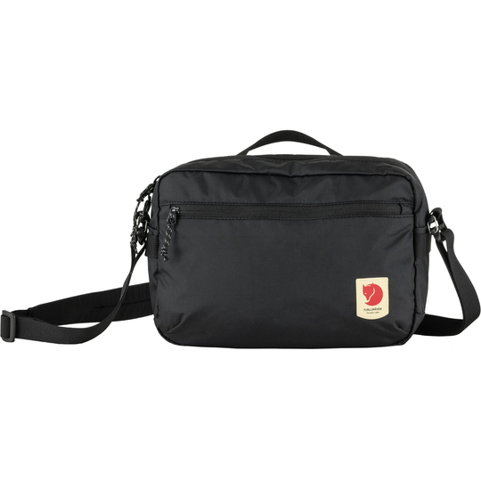 High Coast Crossbody bag in recycled polyamide with adjustable strap and multiple pockets.