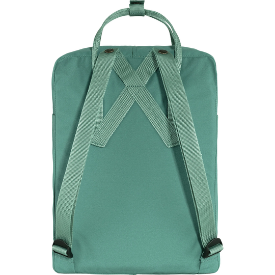 Zaino Kånken verde con spallacci e maniglia superiore.