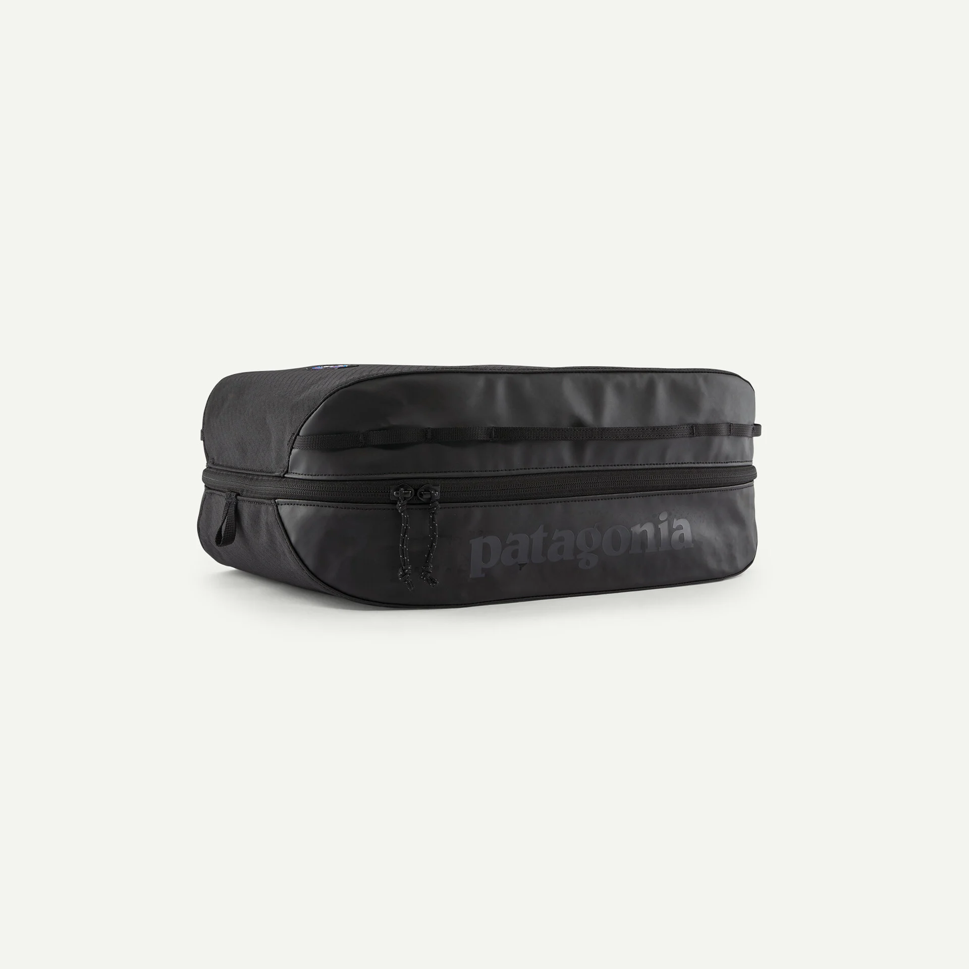 Black Hole Cube 14L portable organizer in black durable recycled fabric with zippered compartments and handle