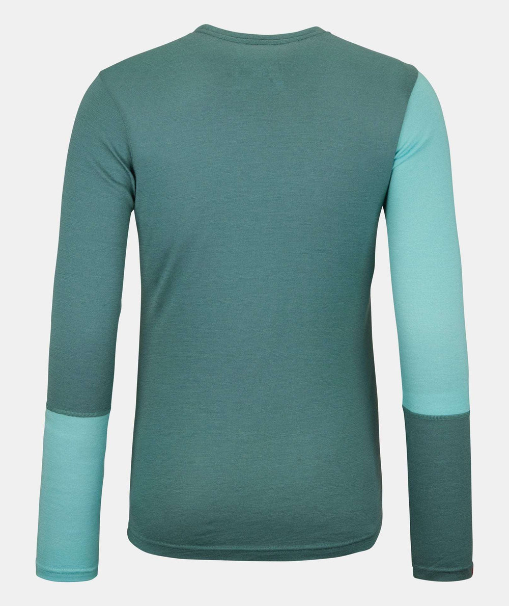 Women's green wool long sleeve with asymmetric design, ideal for winter adventures.