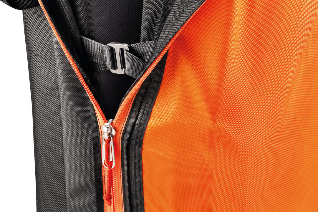 Close-up of Crash Pad Alto's robust orange fabric and durable zipper design.