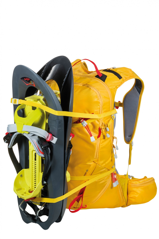 Zaino Rutor 25 yellow backpack with attached snowshoes, designed for alpine skiing with gear compartments.